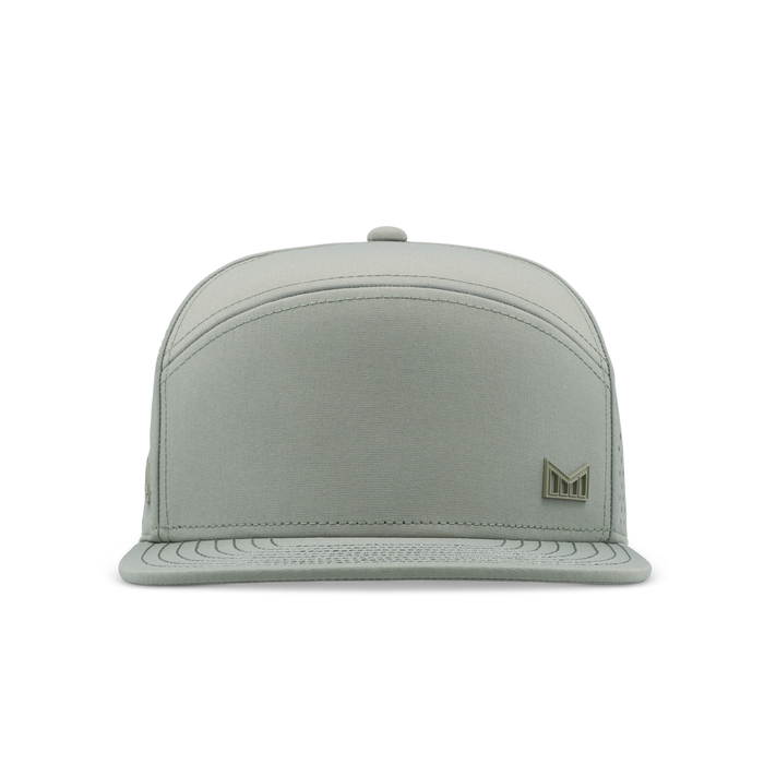 Sage green snapback cap with structured crown, embroidered logo on front, and textured brim.