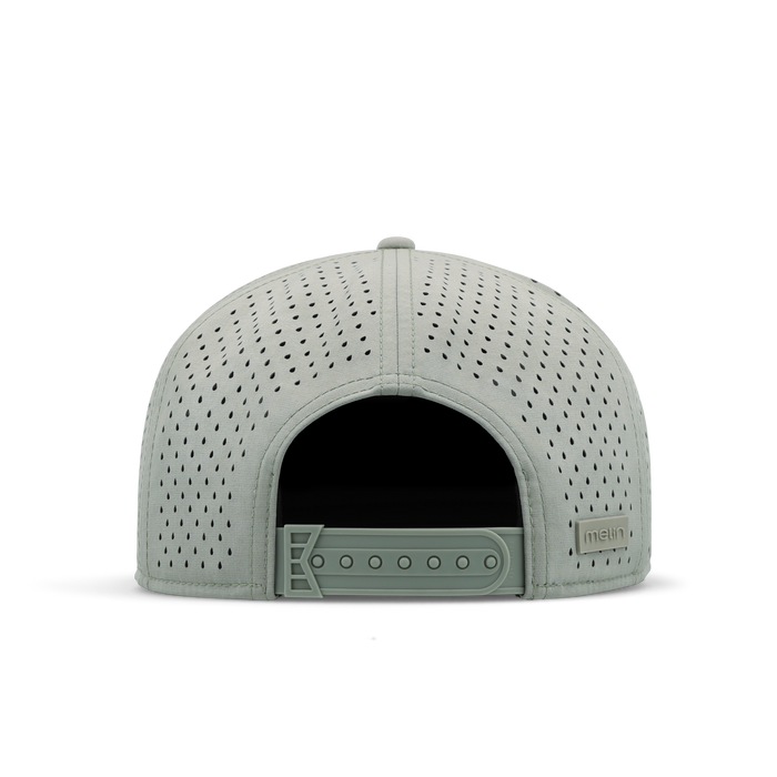 Sage green perforated baseball cap with structured crown and adjustable snapback closure, shown from back view.