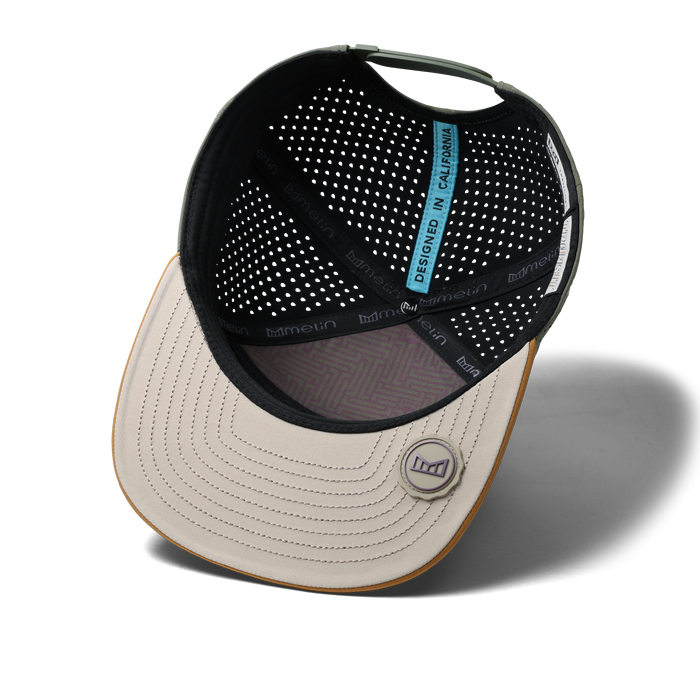 The inside view of the melin Horizon Fit Trenches Icon Hydro hat in transit