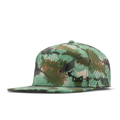 The angled view of the melin Horizon Fit Trenches Icon Hydro hat in watercolor camo