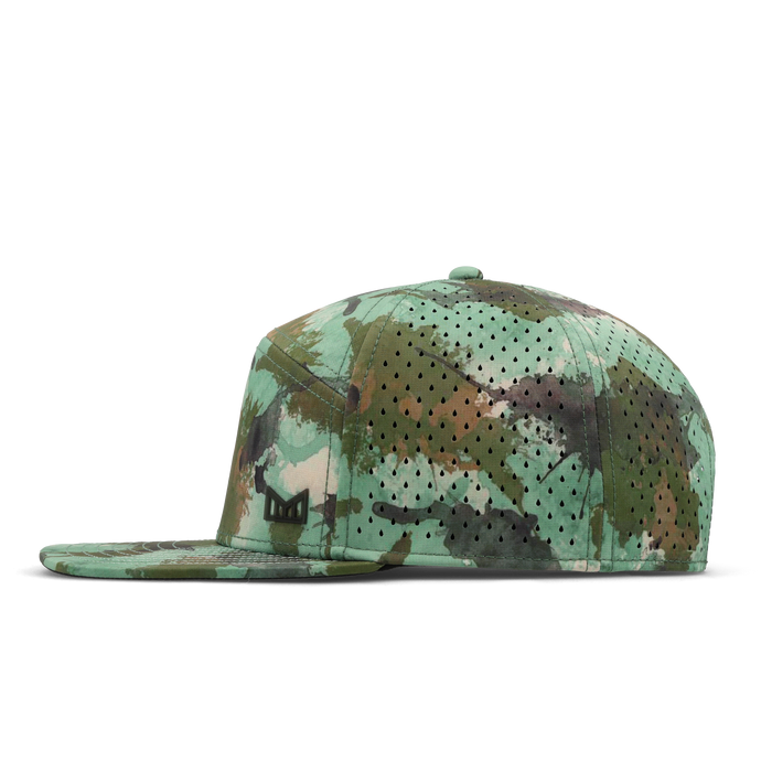 The side view of the melin Horizon Fit Trenches Icon Hydro hat in watercolor camo