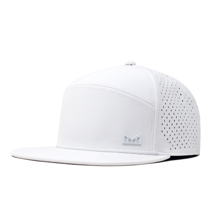 The angled view of the Melin Horizon Fit Trenches Icon Hydro hat in white