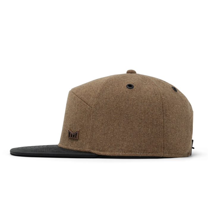 The side view of the melin Trenches Icon Scout Thermal  Horizon Fit in Caramel