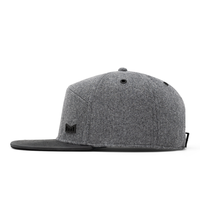 The side view of the melin Trenches Icon Scout Thermal  Horizon Fit in Heather Grey / Black