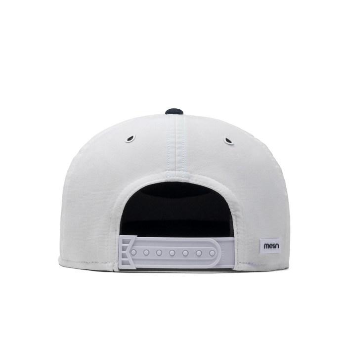 The back view of the melin Trenches Links Drive Hydro  Horizon Fit in  Navy / White