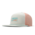 The front, angled view of the melin Trenches Links Hydro  Horizon Fit in  Peach Nectar