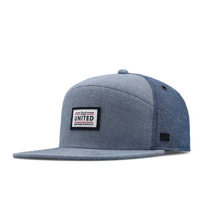 The front, angled view of the melin Trenches Mill United  Horizon Fit in  Chambray