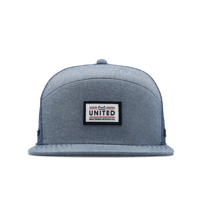 The front view of the melin Trenches Mill United  Horizon Fit in  Chambray