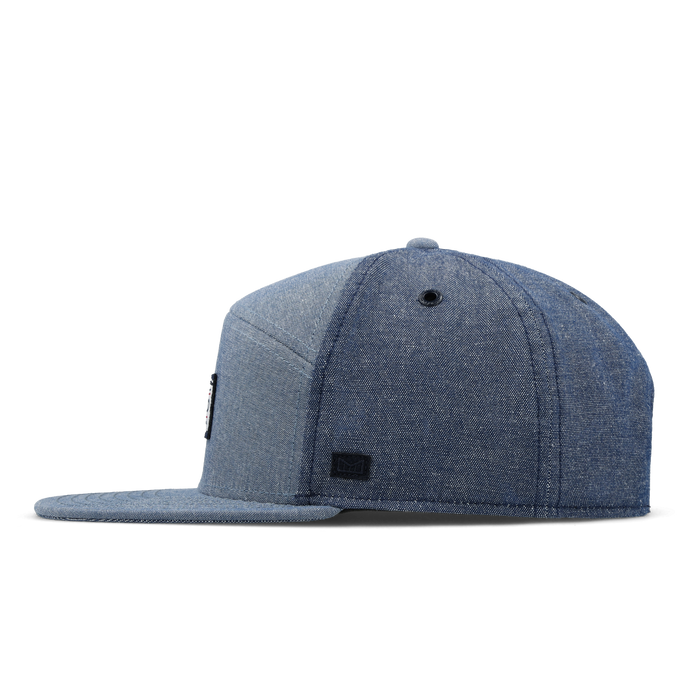The side view of the melin Trenches Mill United  Horizon Fit in  Chambray