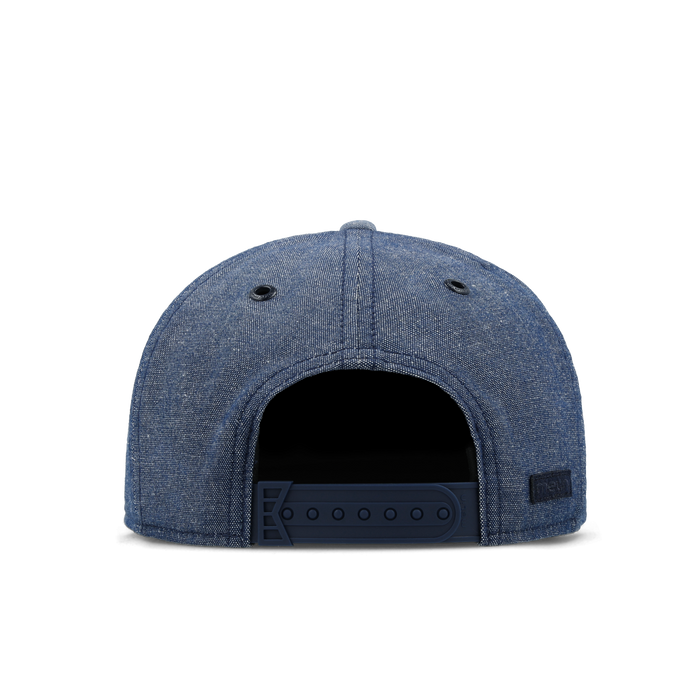 The back view of the melin Trenches Mill United  Horizon Fit in  Chambray