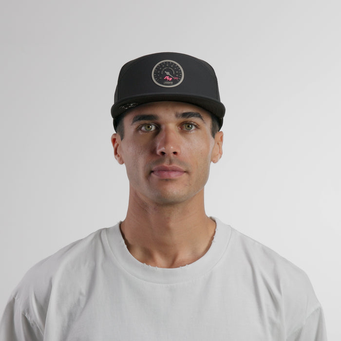 The model-image of the melin Horizon Fit Trenches Tach'd hat in black
